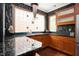 Well-lit kitchen featuring custom cabinets, granite countertops, and stainless steel appliances at 1216 E Rock Springs Ne Rd, Atlanta, GA 30306