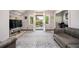 Living room with gray couches and access to a balcony at 1216 E Rock Springs Ne Rd, Atlanta, GA 30306