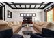 Stylish living room featuring twin sofas, a modern coffee table, and unique ceiling design at 1216 E Rock Springs Ne Rd, Atlanta, GA 30306