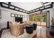 Cozy living room featuring comfortable seating, stylish decor, and access to an outdoor patio at 1216 E Rock Springs Ne Rd, Atlanta, GA 30306