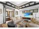 Cozy living room showcasing elegant sofas, modern TV, and dark trim at 1216 E Rock Springs Ne Rd, Atlanta, GA 30306