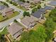 Aerial view of homes with manicured lawns in a well-maintained neighborhood at 1314 Bentley Estates Dr, Dacula, GA 30019