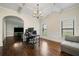 Stylish office space with hardwood floors, tray ceiling, and natural light at 1314 Bentley Estates Dr, Dacula, GA 30019