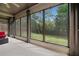 Inviting screened porch with backyard at 1314 Bentley Estates Dr, Dacula, GA 30019