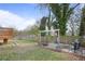 Private backyard with a fire pit area, seating, and a wooden fence at 2222 Hill Nw St, Atlanta, GA 30318