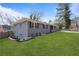 Well-maintained home with a green lawn and landscaped flower beds at 2222 Hill Nw St, Atlanta, GA 30318