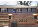 Charming front exterior with a decorative fence and clearly marked address at 2222 Hill Nw St, Atlanta, GA 30318