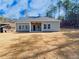 The backyard features lush greenery, offering ample space for outdoor activities and relaxation at 5096 Cumberland Ct, Villa Rica, GA 30180