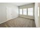 Spacious bedroom with ample natural light and neutral tones, ready for personalization at 5096 Cumberland Ct, Villa Rica, GA 30180