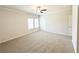 Expansive bedroom featuring plush carpeting, dual windows, and private entrance at 5096 Cumberland Ct, Villa Rica, GA 30180