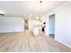 Open-concept living area featuring modern finishes and luxury vinyl plank flooring at 5096 Cumberland Ct, Villa Rica, GA 30180