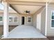 Covered patio featuring recessed lighting and a ceiling fan, perfect for outdoor entertaining and relaxation at 5096 Cumberland Ct, Villa Rica, GA 30180