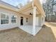 Covered patio featuring recessed lighting and a ceiling fan, creating an inviting outdoor space for entertainment at 5096 Cumberland Ct, Villa Rica, GA 30180