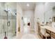 Bright bathroom features granite counters, a walk-in shower, and a walk-in closet in view at 608 Red Leaf Way, Canton, GA 30114