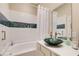Stylish bathroom featuring a tub and vessel sink at 608 Red Leaf Way, Canton, GA 30114