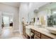 Bright bathroom features double sinks, granite counters, a walk-in shower, and a walk-in closet in view at 608 Red Leaf Way, Canton, GA 30114