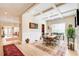 Open dining area with trey ceilings and easy access to the living room and kitchen at 608 Red Leaf Way, Canton, GA 30114