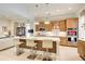 Stylish kitchen boasts a large island and open layout at 608 Red Leaf Way, Canton, GA 30114