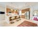 Modern kitchen with stainless steel appliances and an island with seating at 608 Red Leaf Way, Canton, GA 30114