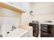 Well-equipped laundry room with modern washer and dryer at 608 Red Leaf Way, Canton, GA 30114