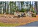 Charming waterfall and stone entrance for a serene welcome at 608 Red Leaf Way, Canton, GA 30114