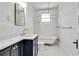 Charming bathroom featuring marble countertops, and a clawfoot tub, offering relaxation and elegance at 1157 Alta Ne Ave, Atlanta, GA 30307