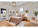 Charming bedroom with decorative lighting, neutral decor, and an en suite bathroom for added convenience at 1157 Alta Ne Ave, Atlanta, GA 30307
