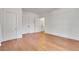 Spacious bedroom featuring hardwood floors and ample natural light, offering comfort and style at 1157 Alta Ne Ave, Atlanta, GA 30307