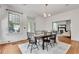 Dining room showing hardwood floors and view into the living room at 1157 Alta Ne Ave, Atlanta, GA 30307