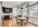 Eat-in kitchen featuring stainless steel appliances, and windows overlooking the backyard at 1157 Alta Ne Ave, Atlanta, GA 30307