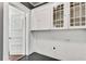 Pantry with white cabinets and wood floors at 1157 Alta Ne Ave, Atlanta, GA 30307