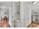 Pantry featuring ample storage space, built in shelves and access to the kitchen at 1157 Alta Ne Ave, Atlanta, GA 30307