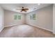 Spacious bedroom features ceiling fan, plush carpet, and natural light at 1304 Anchor Sw Ter, Atlanta, GA 30311