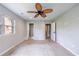 Spacious bedroom featuring neutral carpet, ceiling fan, and ample natural light at 1304 Anchor Sw Ter, Atlanta, GA 30311