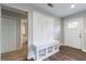 Cozy entryway with built-in bench and storage, next to the entry door at 1304 Anchor Sw Ter, Atlanta, GA 30311
