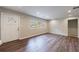 Inviting living room with wood floors, natural light, and a view of the front yard at 1304 Anchor Sw Ter, Atlanta, GA 30311