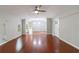 Spacious living room featuring hardwood floors, modern lighting and views to other rooms at 1304 Anchor Sw Ter, Atlanta, GA 30311