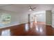 Large living room featuring hardwood floors and modern lighting at 1304 Anchor Sw Ter, Atlanta, GA 30311