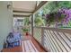 Inviting balcony with hanging flower baskets, offering a serene and picturesque outdoor living experience at 690 Mcgill Ne Pl, Atlanta, GA 30312