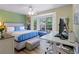 This bedroom has a large bay window providing ample natural light, complementing the neutral color scheme at 690 Mcgill Ne Pl, Atlanta, GA 30312