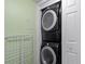 Convenient laundry closet with stacked washer and dryer units at 690 Mcgill Ne Pl, Atlanta, GA 30312