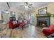 Inviting living room with fireplace, natural light, and wood floors at 690 Mcgill Ne Pl, Atlanta, GA 30312
