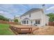 A wooden deck and fenced yard behind the house at 1130 Laurel Cove Dr, Snellville, GA 30078
