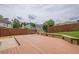 A large wooden deck sits in a fenced backyard at 1130 Laurel Cove Dr, Snellville, GA 30078