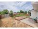 Backyard with a wooden deck, stone and grass at 1130 Laurel Cove Dr, Snellville, GA 30078