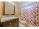 Bathroom featuring vanity sink, a mirror, a toilet, and a shower with curtain at 1130 Laurel Cove Dr, Snellville, GA 30078