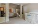 Spacious main bedroom has a connected Bedroom, neutral tones, and carpet at 1130 Laurel Cove Dr, Snellville, GA 30078