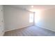 Bedroom with neutral carpeting, white walls, and a window for natural light at 2 Loth Wages (Lot 2) Rd, Dacula, GA 30019