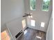 Bright living room featuring hardwood floors, an electric fireplace, and lots of windows at 2 Loth Wages (Lot 2) Rd, Dacula, GA 30019