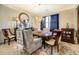 Charming dining room with wood table, chandelier, and elegant decor at 345 Piedmont Cir, Covington, GA 30016